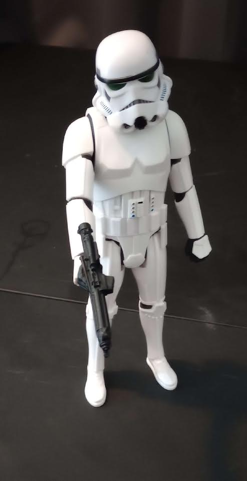 Star Wars Stormtrooper action figure front view with blaster rifle