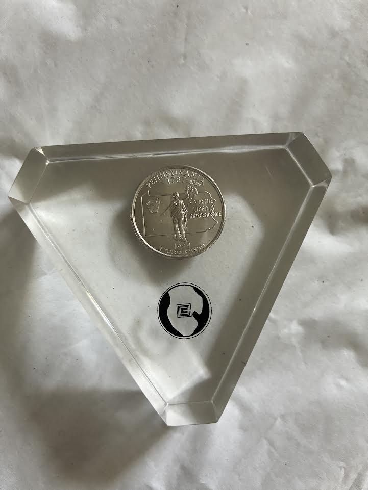 1999 Pennsylvania State Quarter reverse in triangular acrylic display case