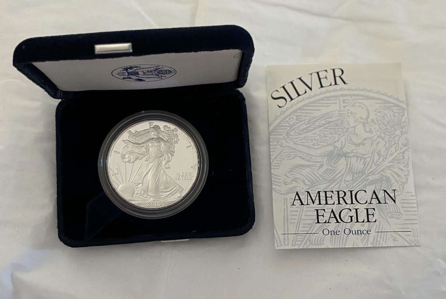 2002 American Silver Eagle coin in black velvet display case with Certificate of Authenticity