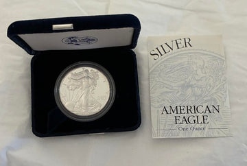 2002 American Silver Eagle coin in black velvet display case with Certificate of Authenticity