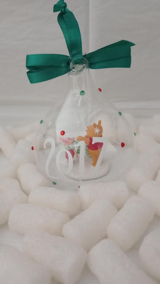 Winnie the Pooh and Piglet glass Christmas ornament front view with green ribbon