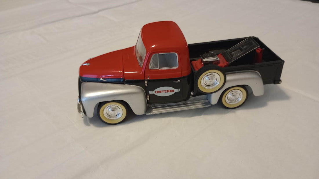 Craftsman limited edition die-cast 1950s pickup truck side view in red black and silver