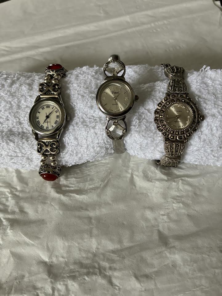 Lot of 3 vintage silver-tone ladies quartz watches - Roman numeral, Vivasi, and ornate marcasite-style