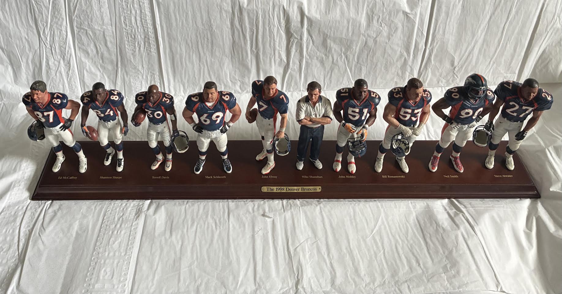 1998 Denver Broncos figurine set front view on wooden base