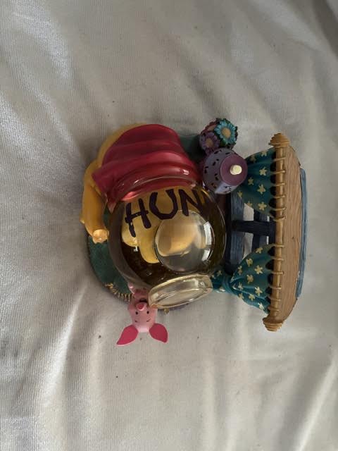 Winnie the Pooh honey pot snow globe figurine - top view
