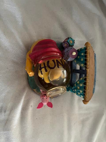 Winnie the Pooh honey pot snow globe figurine - top view