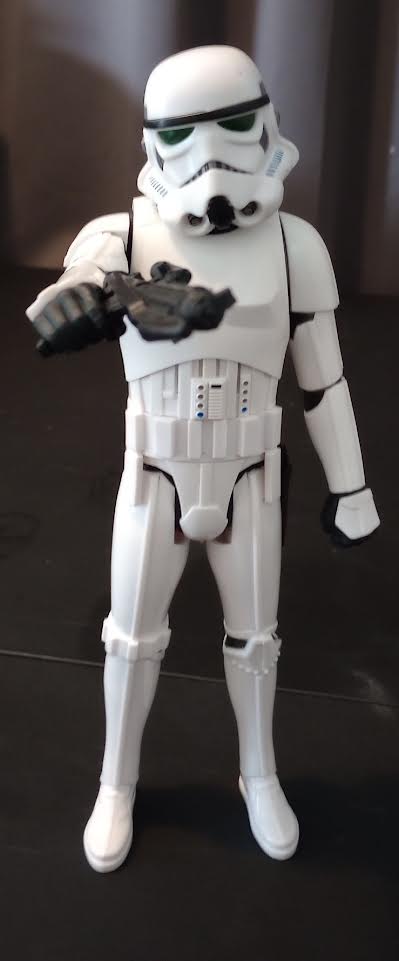 Star Wars Stormtrooper action figure holding blaster up close