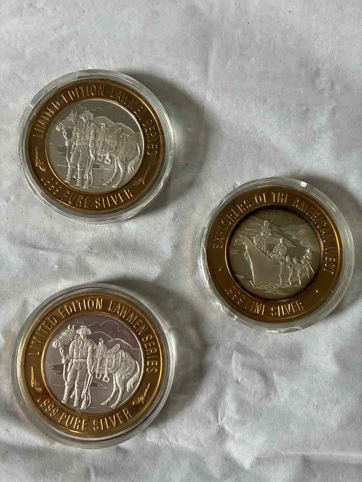 Limited Edition Lawmen Series and Explorers of the American West .999 pure silver rounds in protective capsules