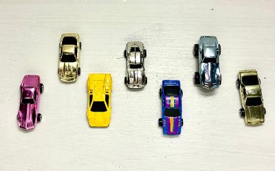 Set of 7 vintage metallic die-cast miniature cars top view