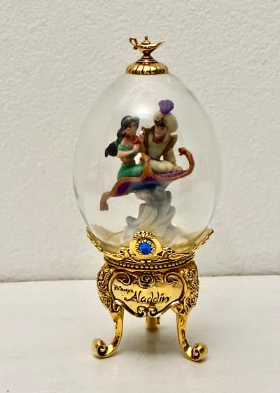 Disney Aladdin Fabergé-style glass egg figurine with gold pedestal